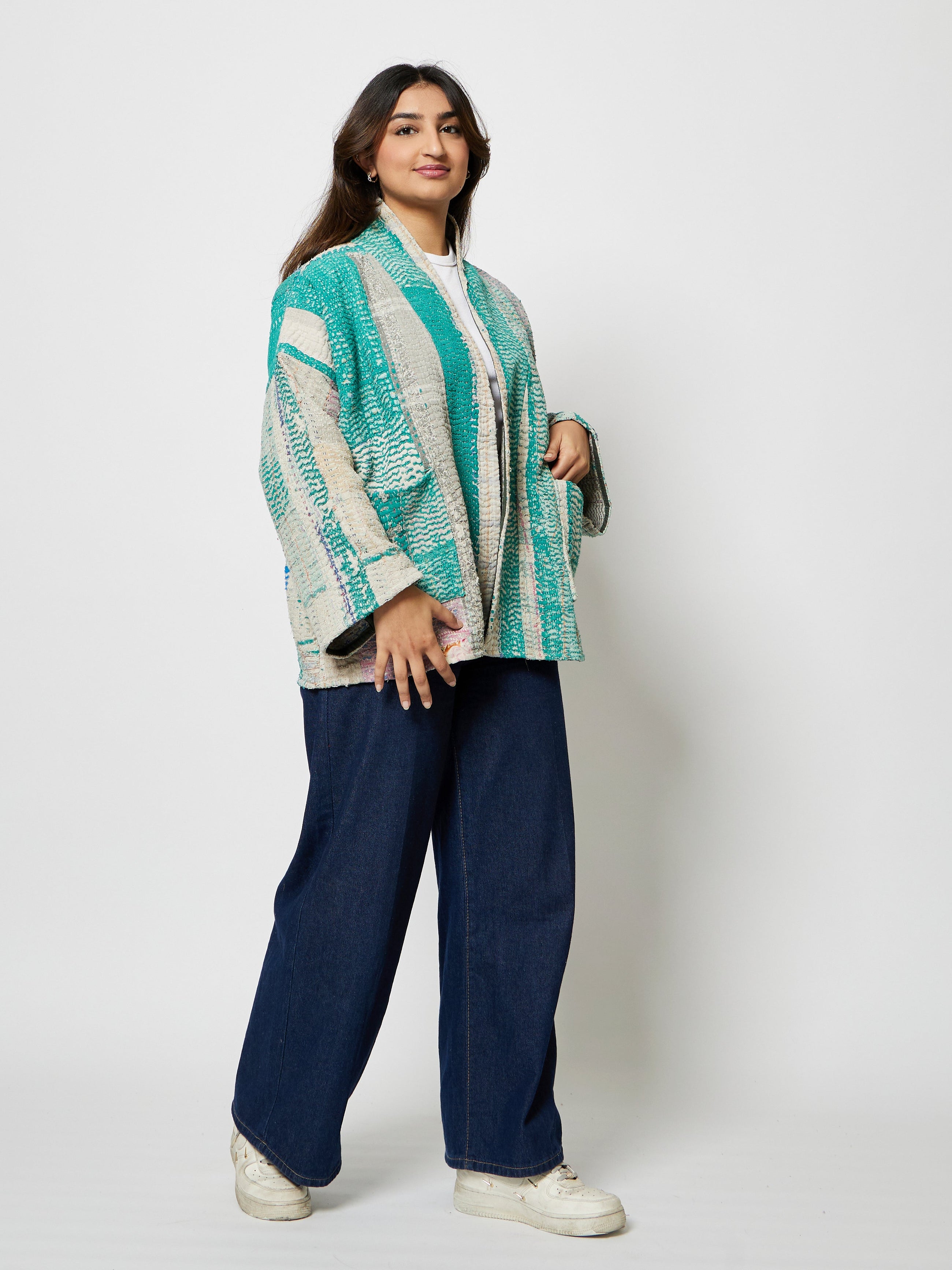 Side profile of model wearing the Maison Kantha Jacket