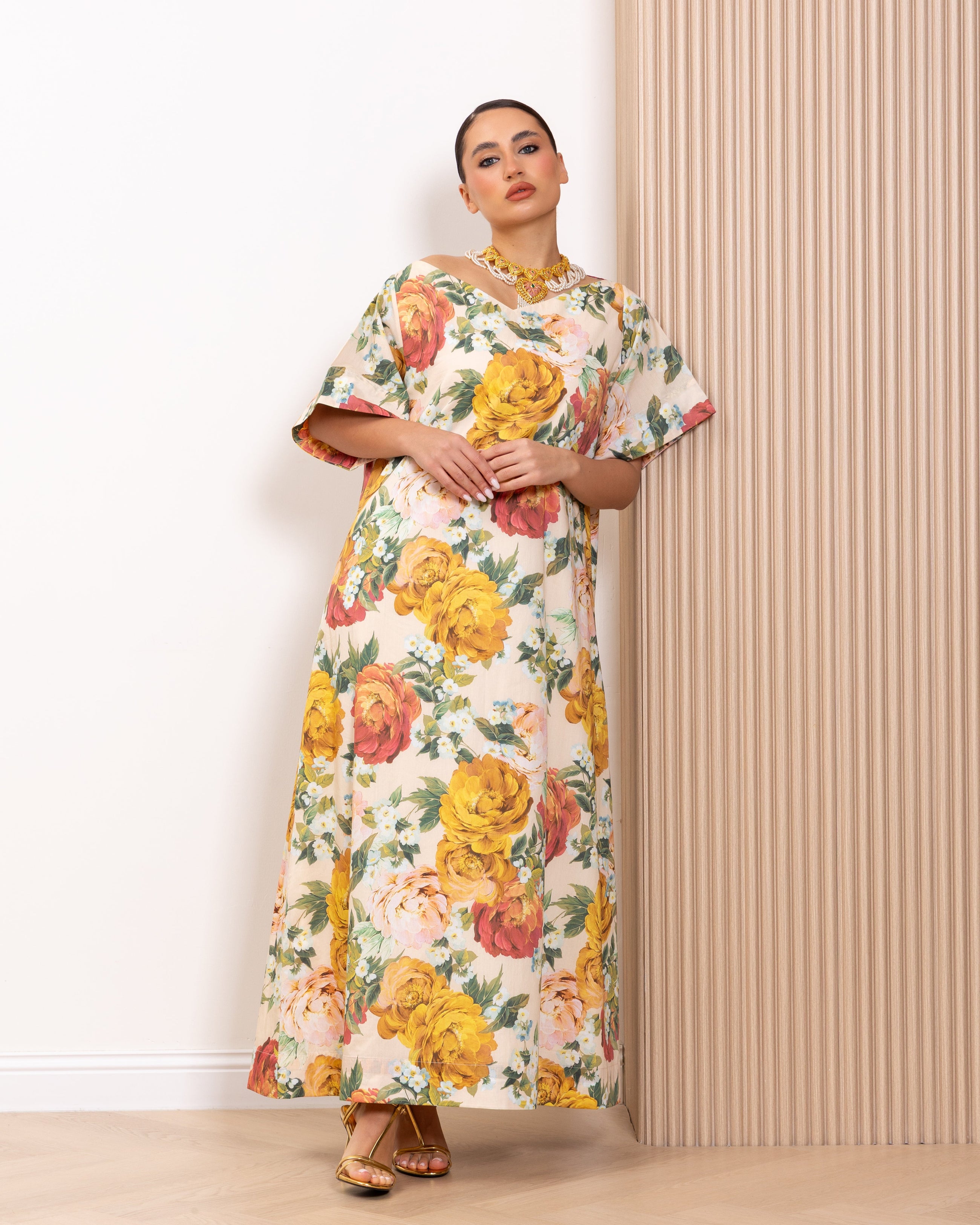 Model wearing the Vintage Bloom Kaftan by Kras the label in breathable lined cotton with relaxed flattering silhouette