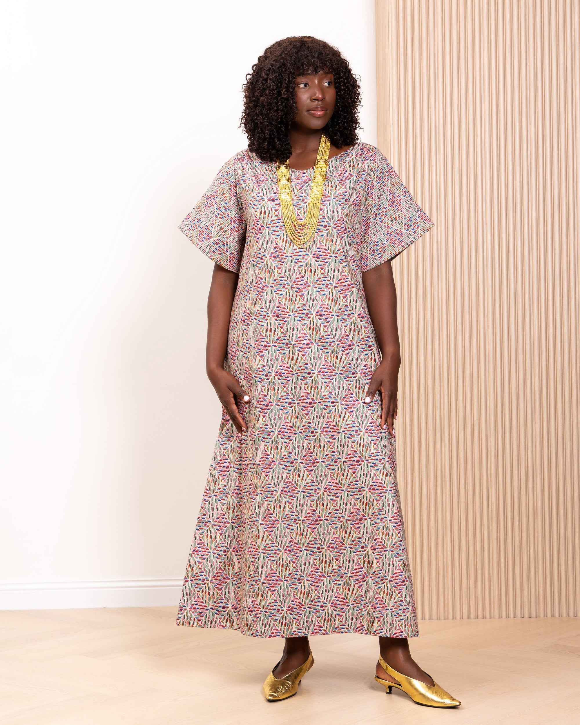 Model wearing the Mosaic kaftan by Kras the Label