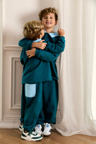 Leo Tracksuit in Teal Pop