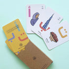 Set of UAE Arabic alphabet flashcards featuring individual Arabic letters with corresponding words and illustrations, designed for early learning and language recognition, displayed in a clean, educational layout suitable for children.
