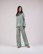 Front view of the Soleia aqua blue floral-inspired two-piece set