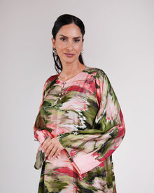 Upper-body view of the Blossom Garden silk dress and its relaxed sleeves.