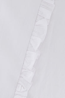 Close-up of the Hazar Azhari Halter Neck Cascading Ruffle Maxi Dress showing the cascading side ruffle detailing.