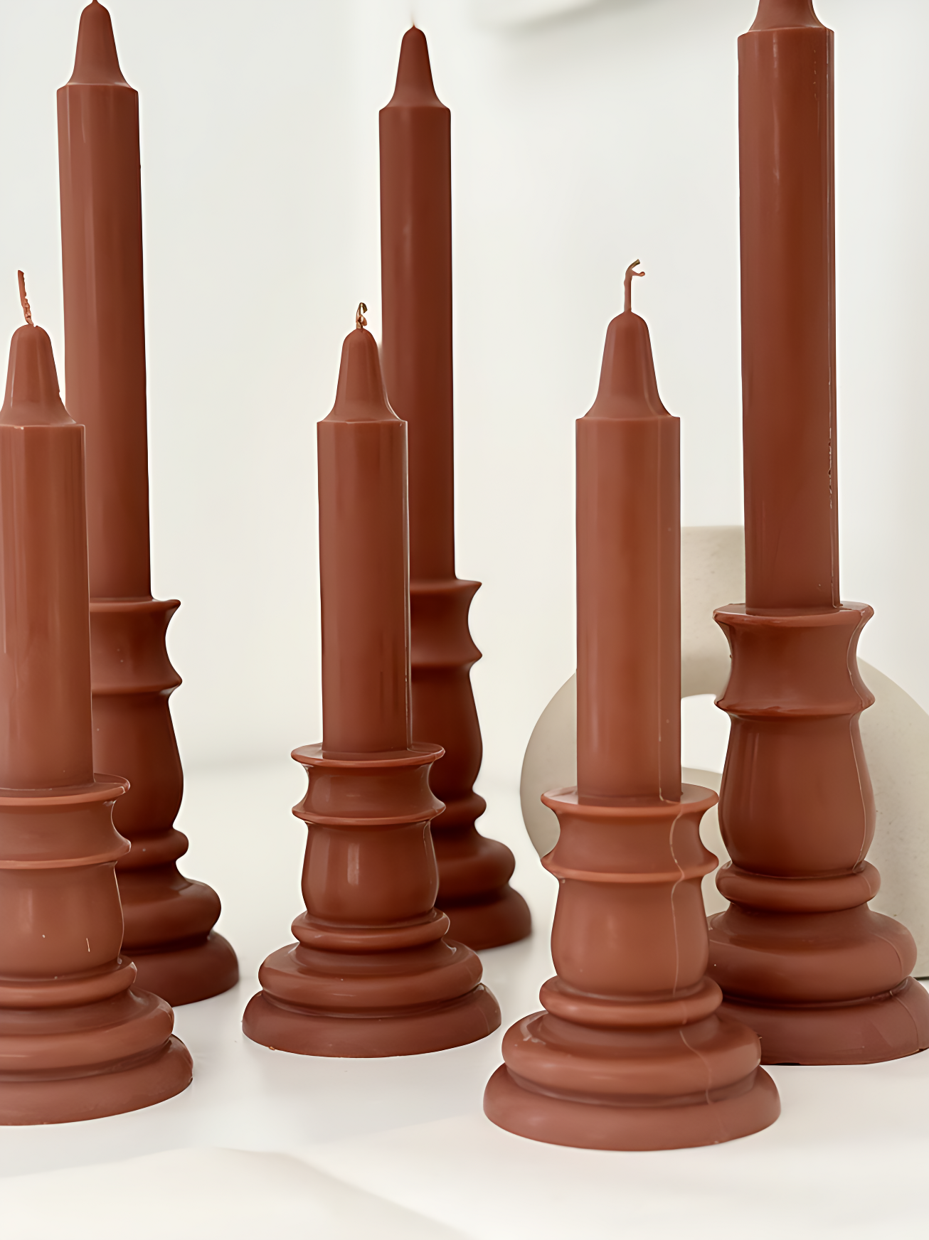 Detail shot of small and large 3altawleh retro candles
