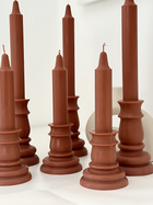 Detail shot of small and large 3altawleh retro candles
