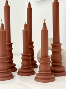 Detail shot of small and large 3altawleh retro candles

