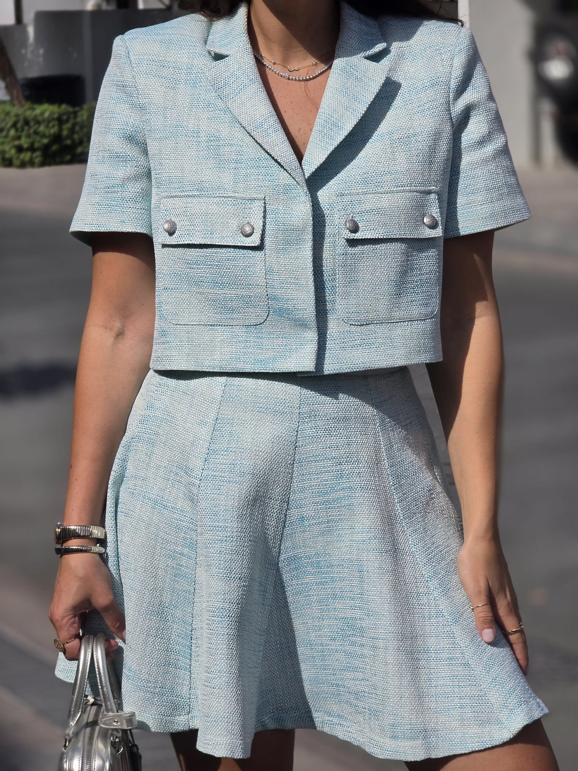 Front detail of the Ice Blue Skirt by  Rèmy Suits