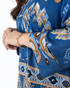 Detail of the L’Artiste bronze, cream and soft blue print on a deep teal cotton base