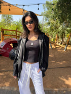 Model wearing the EOS X Remy Joggers in white
