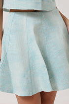 Close-up detail shot of the Portofino Mare Skirt by Rèmy Suits