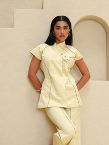 Model posing wearing the Sunveil Co-Ord Short-Sleeve Edition 