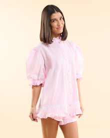 Alma Blossom pink pyjama set with puff sleeves, white eyelet lace trim and ruffled hem, handmade in Dubai