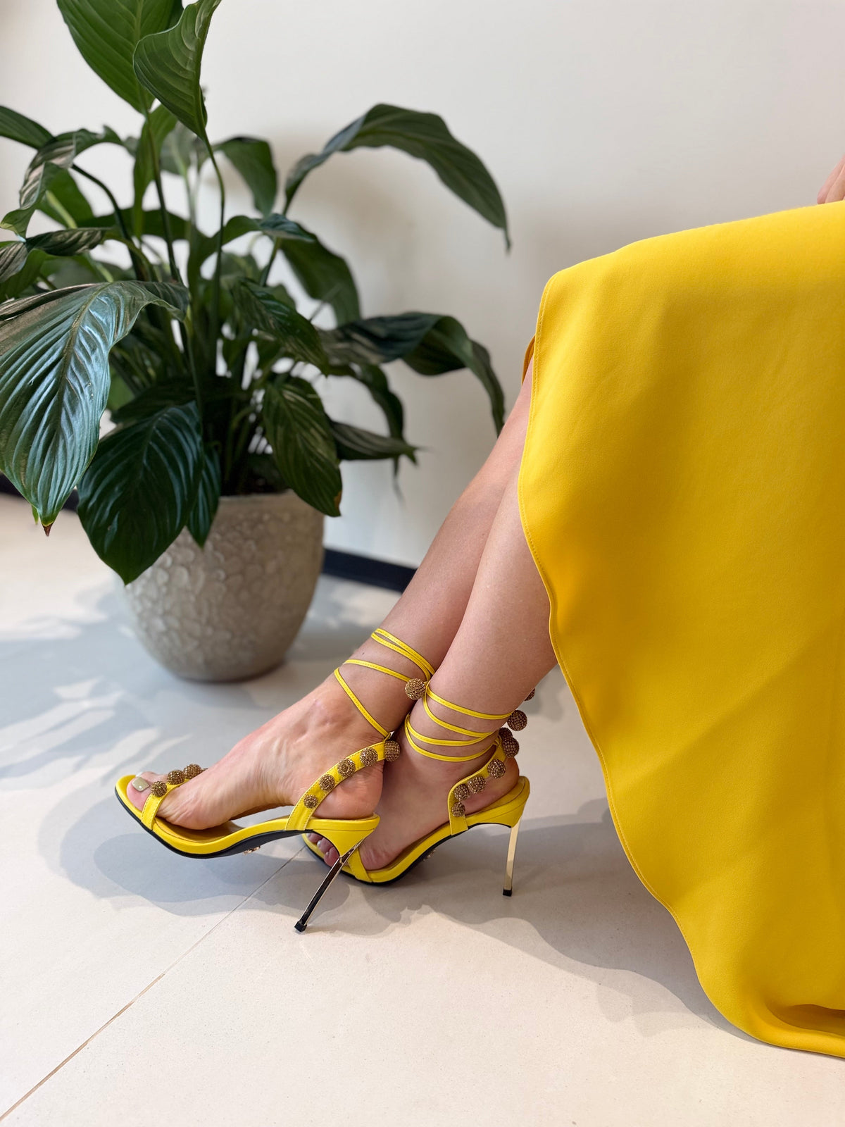 Model wearing the Sunset Jewel Sandals by Subashini Heels