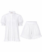 Alma Gardenia Set flat lay: white cotton pin-tuck top with frilled high collar and eyelet lace trim, with matching frilled shorts