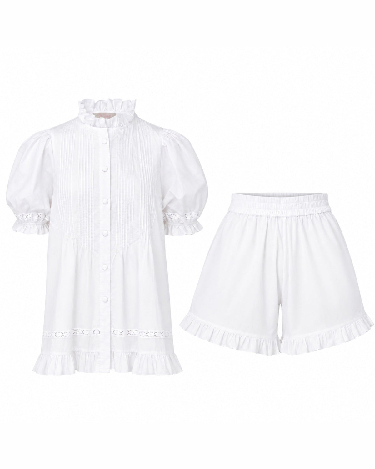 Alma Gardenia Set flat lay: white cotton pin-tuck top with frilled high collar and eyelet lace trim, with matching frilled shorts