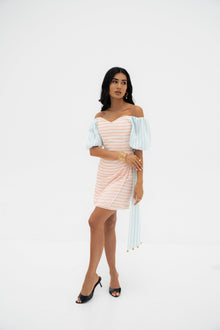 Model wearing the Azelia dress by Ragimora