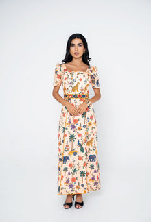 Model wearing the Savannah dress by Ragimora