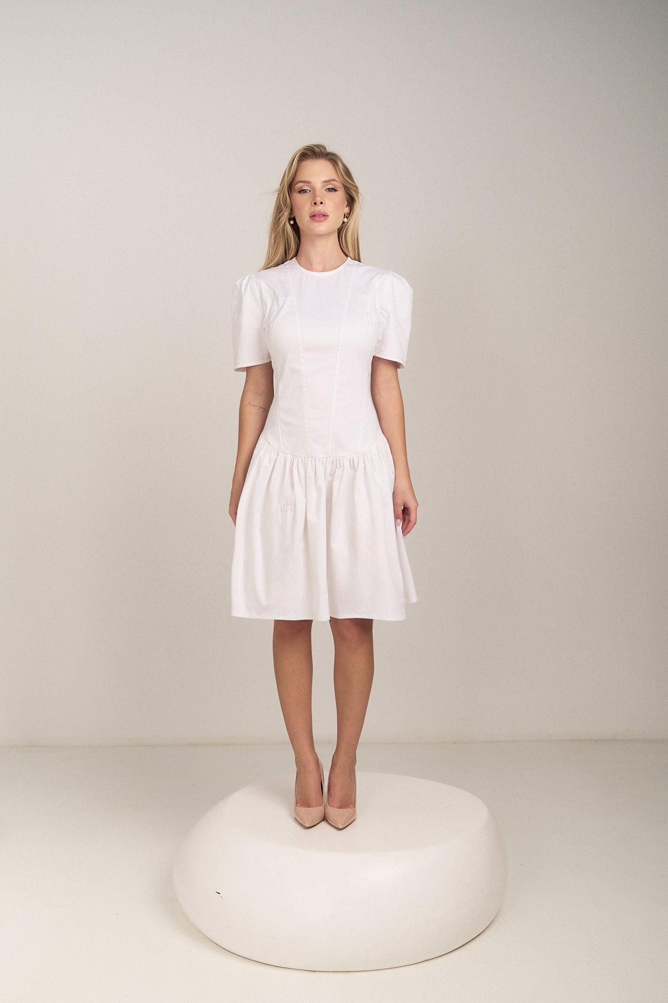 Front detail of the Contrast Stitch Drop Waist Mini Dress by Hazar Azhari 