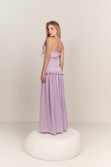 Side profile of the Ruffle Halter Polka Dot Maxi Dress by Hazar Azhari
