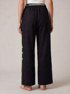 Back detail of the Aether Linen Trouser in black by Muda Clothing