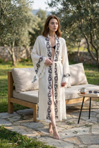 Model posing wearing the Florentia Kimono by Zerla Studio