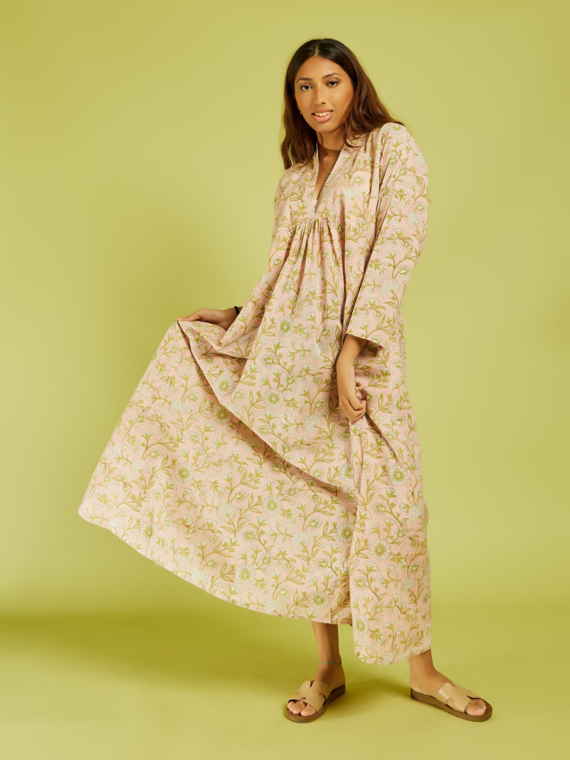 Model is wearing the Zahra Dress by Kyshmysh