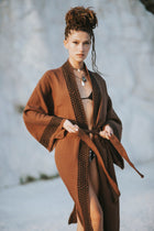 Woman posing wearing the Petra Kimono by Zerla Studio