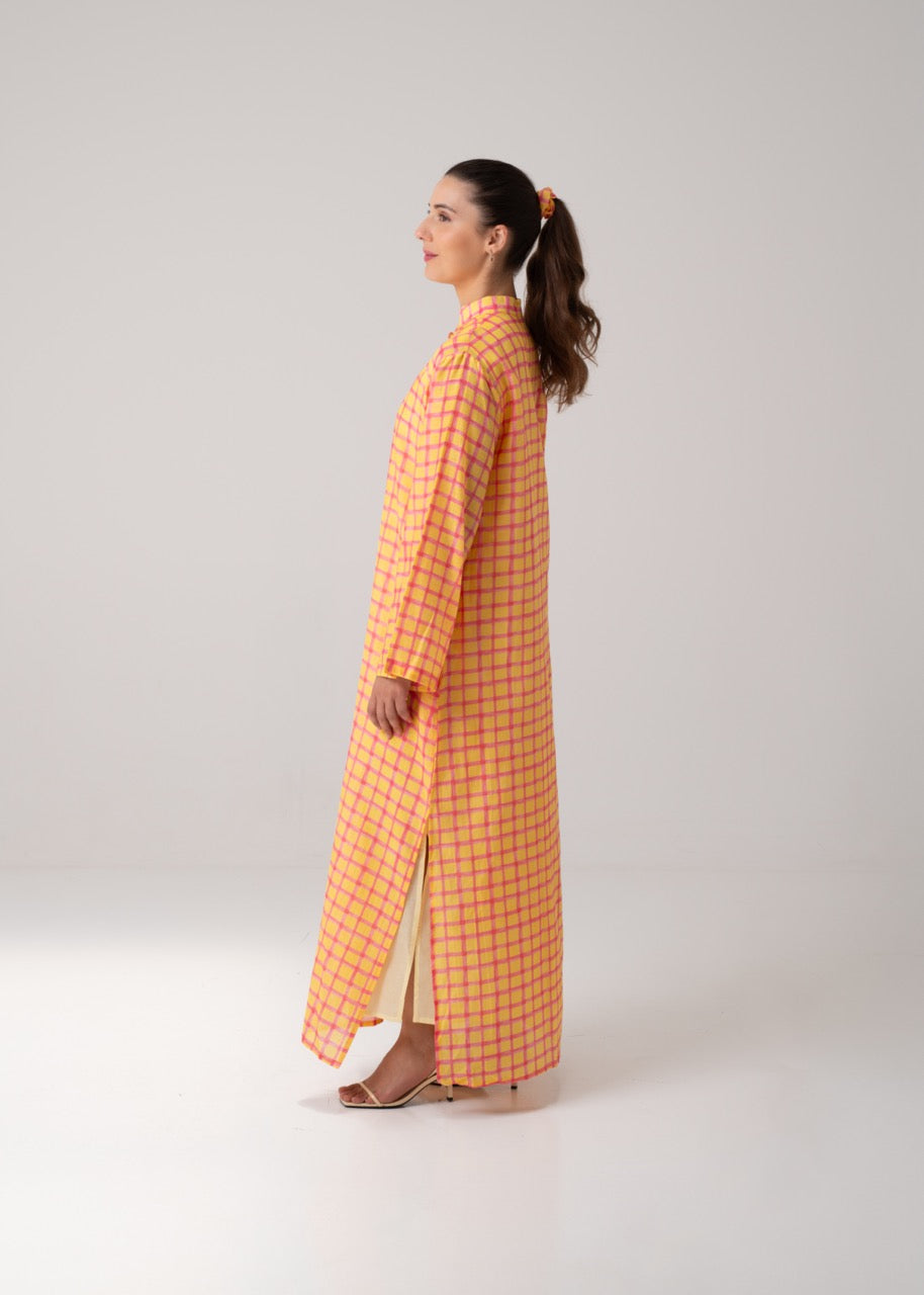Side profile of the Long Printed Kaftan - Checkered by Maison Mar