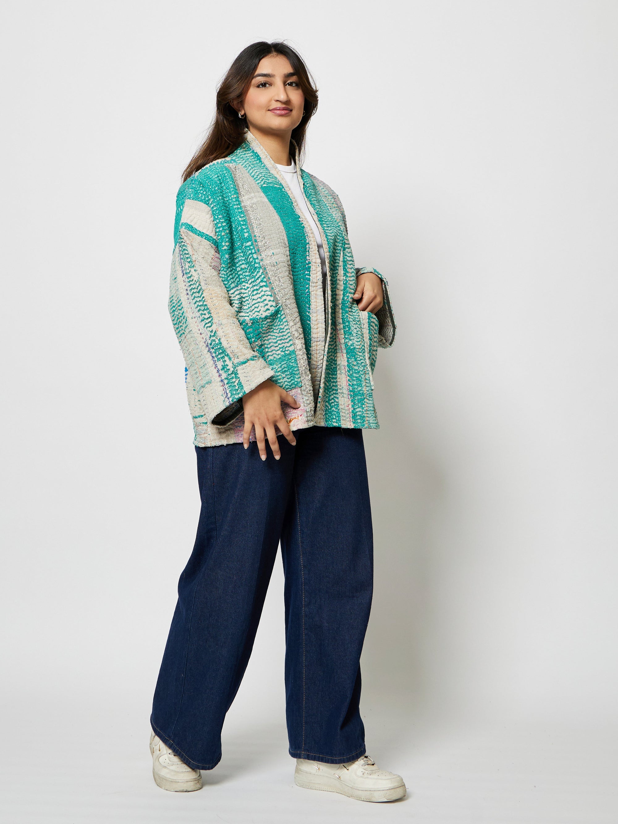Side profile of model wearing the Maison Kantha Jacket