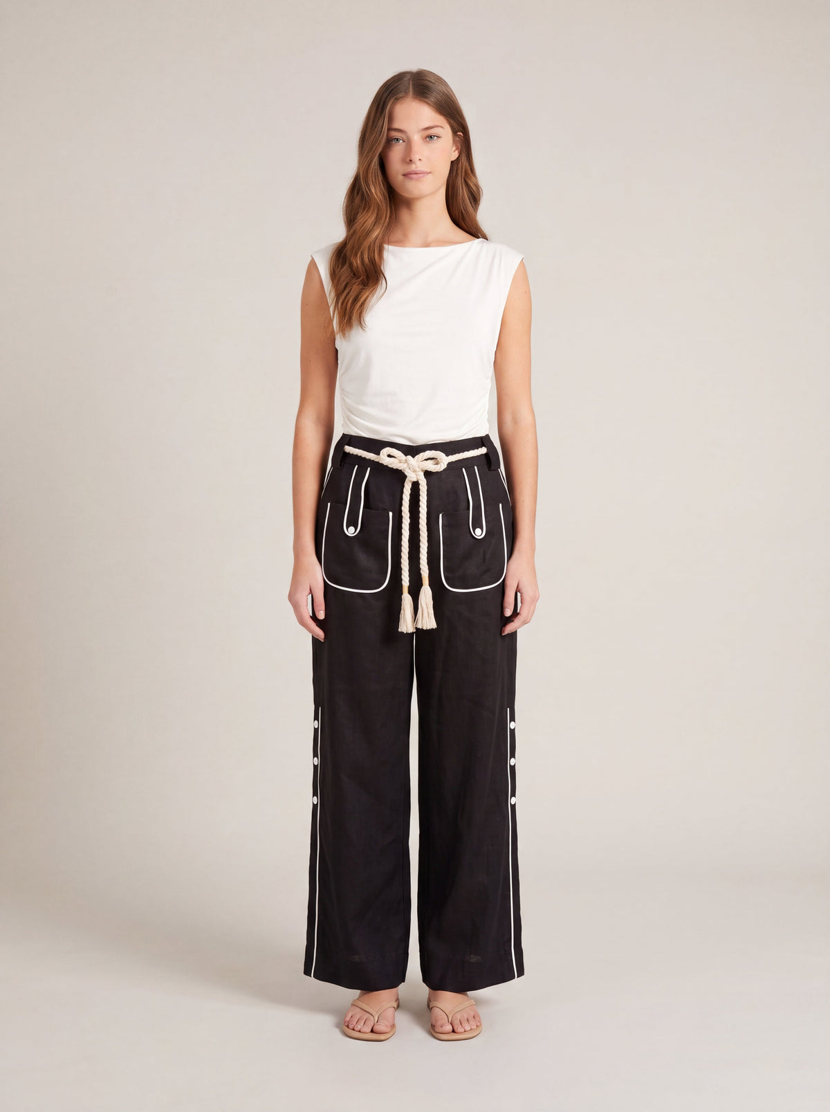 Model wearing the Aether Linen Trouser 