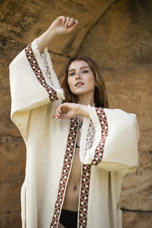 Model posing wearing the Solin Kimono by Zerla Studio 