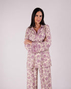 Model wearing the Soleia light purple and nude printed silk two-piece set