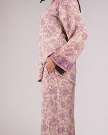 Detail of the Soleia light purple silk top showing its print and sleeve cuff