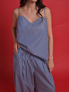 Model wearing the Rêzan top and trousers