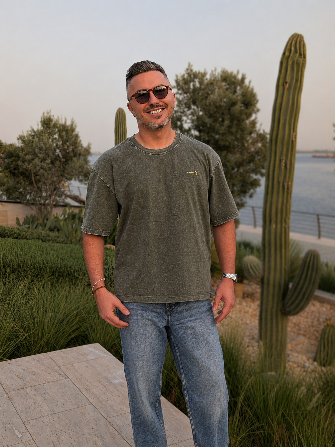Model wearing the Olive Oversized T-shirt by Nabat and Hagat
