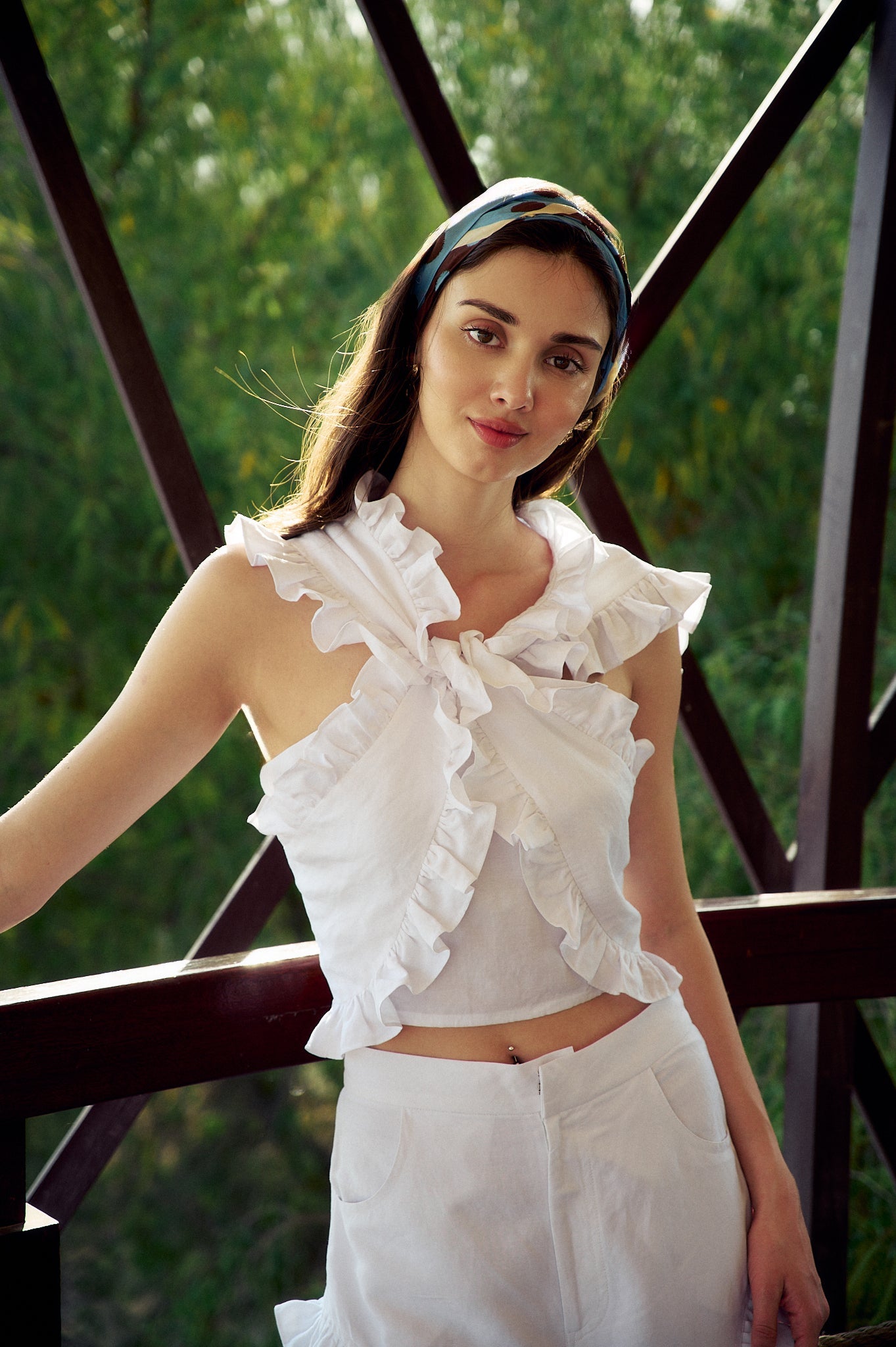 Model wearing the Hazar Azhari Cascading Ruffle Two Piece Set with cascading ruffle detailing.