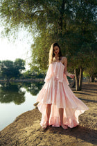 Model wearing the Hazar Azhari Cascading Ruffle Linen Maxi Dress.