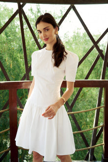 Model wearing the Contrast Stitch Drop Waist Mini Dress by Hazar Azhari 
