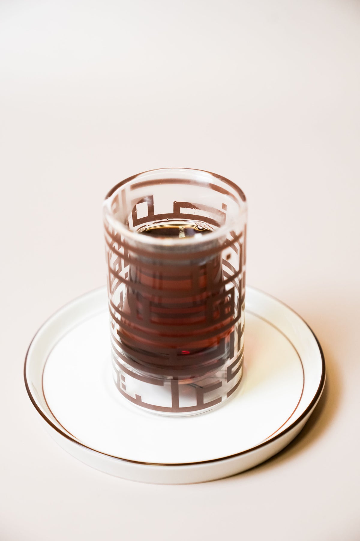 Ramadan tea set with bronze calligraphy detail, double-wall insulated cup and saucer by Doric Home